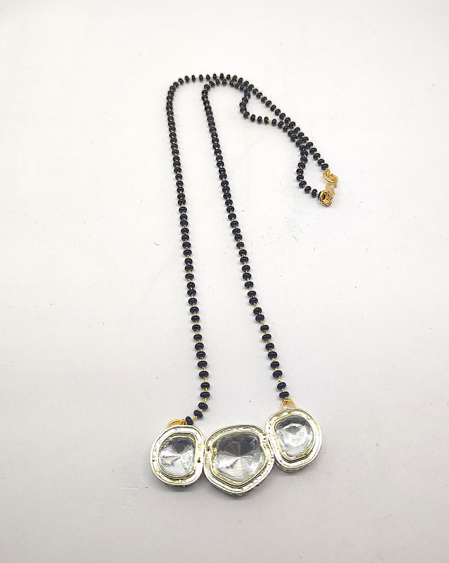 Elegant Black Beaded Mangalsutra with Oversized Kundan Stones