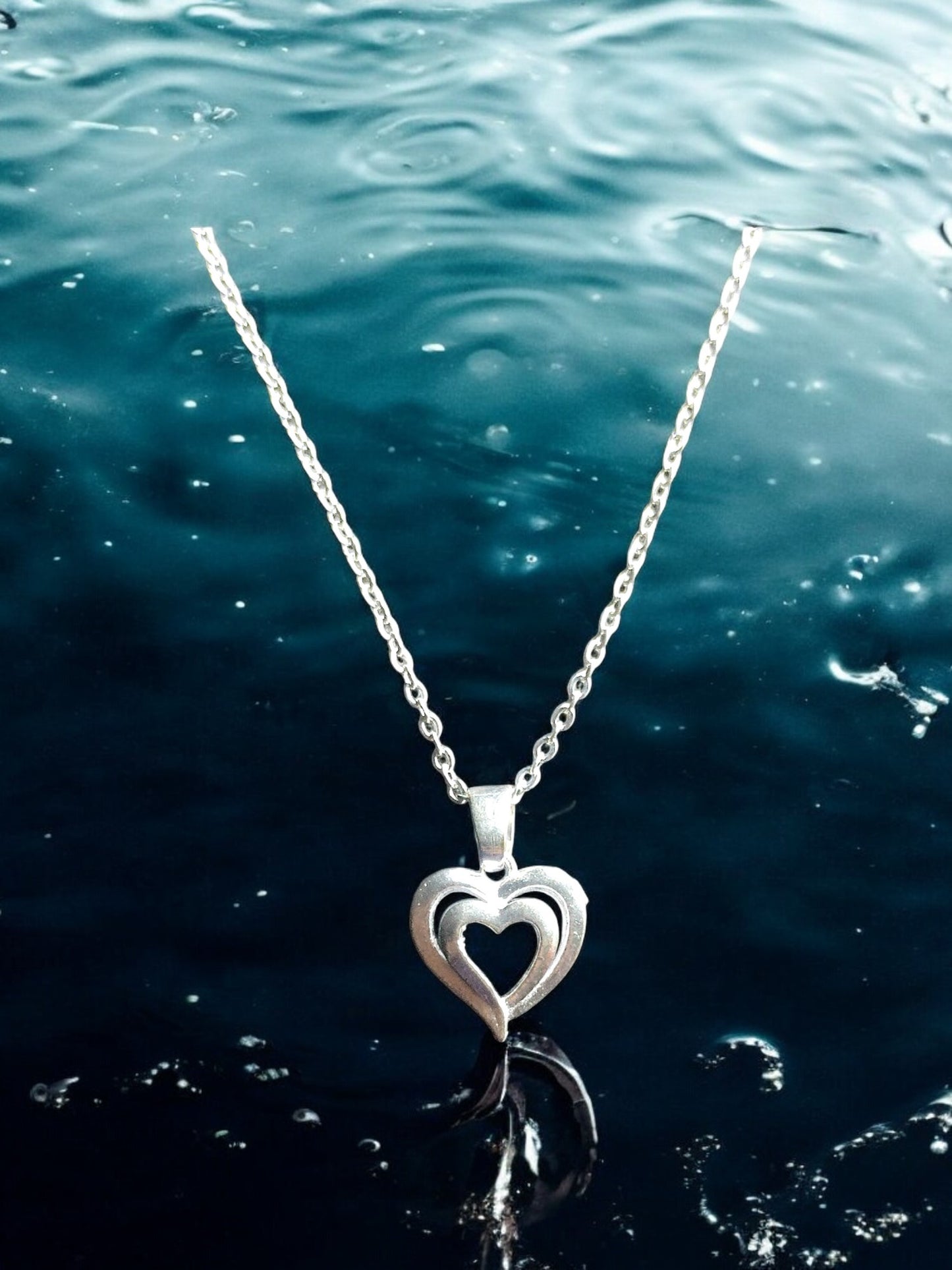 Elegant Dual Heart Silver Pendant with chain