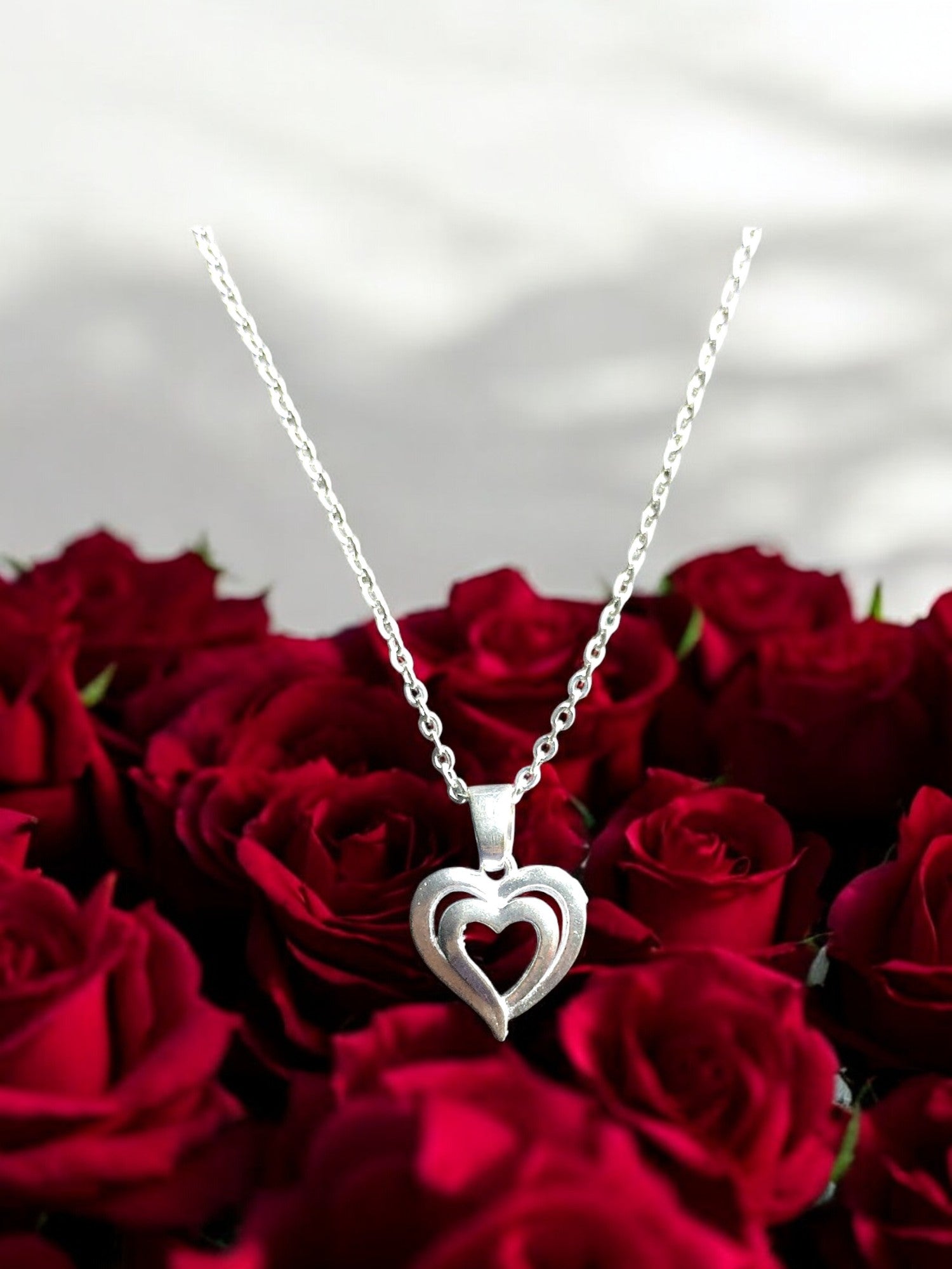 Elegant Dual Heart Silver Pendant with chain