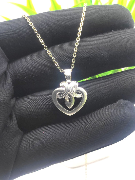 Silver Heart Pendant with Nested Heart Design 06